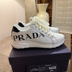 Prada Women's White leather Sneakers in size 37.5!
